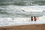 Twee meisjes op het strand