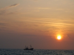 Schip bij zonsondergang
