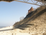 Protection of cliffs against erosion by geotextile and gabion structures