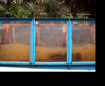 The secondary waves arising behind the submerged bars – the real way of decreasing of wave period.