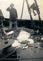 Visser met pint bij vangst (platvissen)